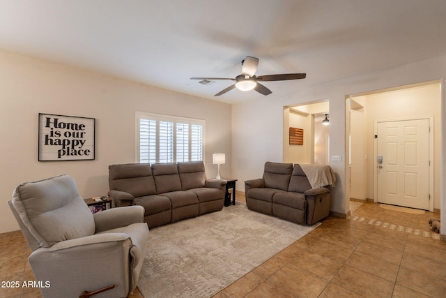 1927 W Mine Trl, Phoenix, AZ 85085 - living room with ceiling fan and light tile patterned floors