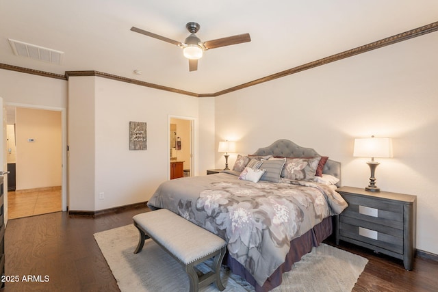 1927 W Mine Trl, Phoenix, AZ 85085 - bedroom featuring dark wood-style floors, ornamental molding, ensuite bathroom, and a ceiling fan