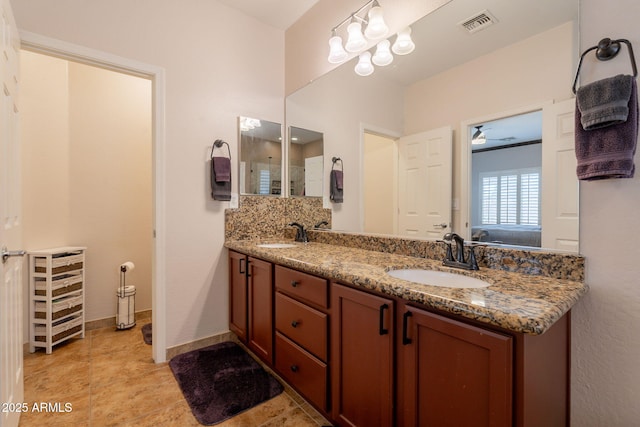 1927 W Mine Trl, Phoenix, AZ 85085 - bathroom with double vanity and tile patterned floors