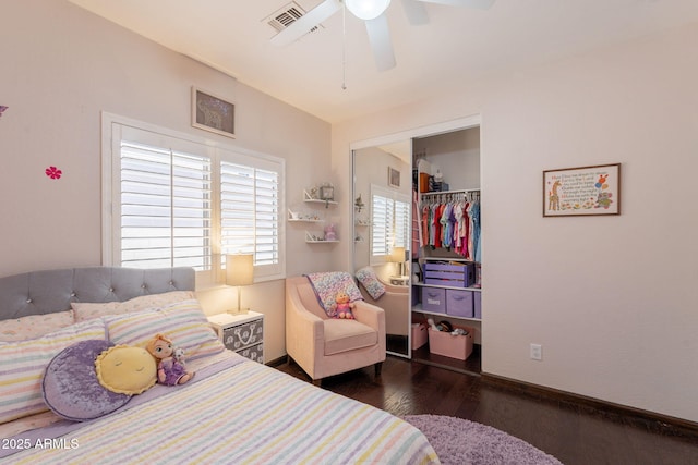 1927 W Mine Trl, Phoenix, AZ 85085 - bedroom featuring wood finished floors, a closet, and a ceiling fan