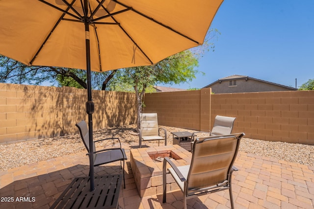 1927 W Mine Trl, Phoenix, AZ 85085 - fenced backyard featuring a patio area and an outdoor fire pit