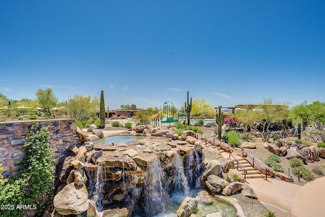 1927 W Mine Trl, Phoenix, AZ 85085 - surrounding community with a garden pond