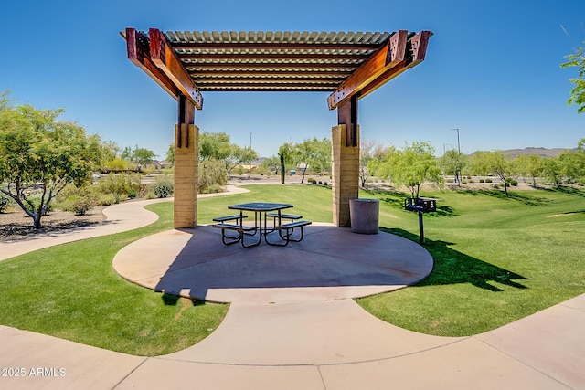 1927 W Mine Trl, Phoenix, AZ 85085 - view of community with a pergola, a lawn, and a patio