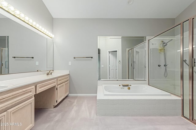 bathroom with vanity and independent shower and bath