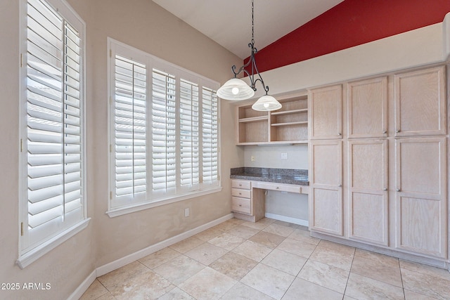 15809 S 31st St, Phoenix, AZ 85048 - unfurnished dining area featuring vaulted ceiling, baseboards, and light tile patterned floors