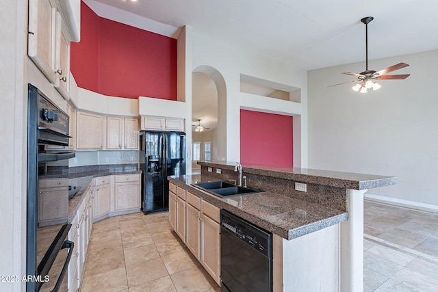 15809 S 31st St, Phoenix, AZ 85048 - kitchen featuring black appliances, a sink, a ceiling fan, a center island with sink, and a towering ceiling