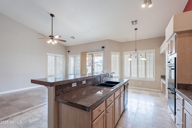 15809 S 31st St, Phoenix, AZ 85048 - kitchen with a sink, baseboards, dark countertops, plenty of natural light, and vaulted ceiling