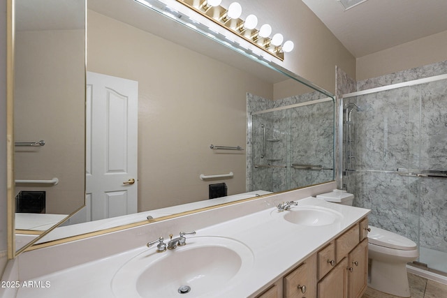 15809 S 31st St, Phoenix, AZ 85048 - full bath featuring toilet, double vanity, a shower stall, and tile patterned flooring
