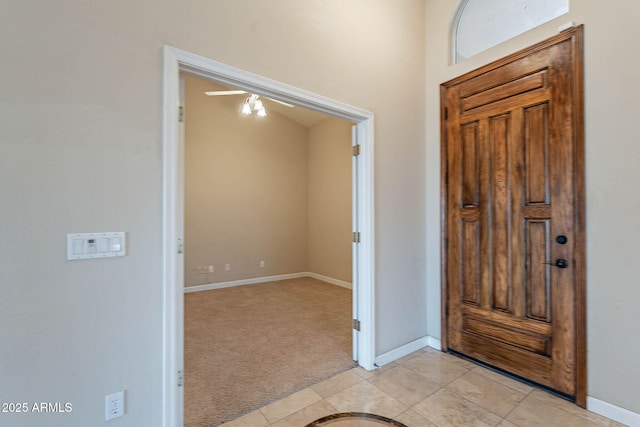 15809 S 31st St, Phoenix, AZ 85048 - entrance foyer with light carpet, baseboards, and light tile patterned floors