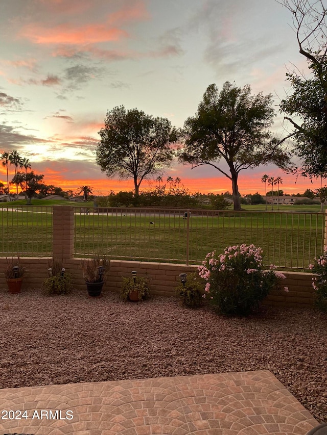 view of home's community featuring a yard