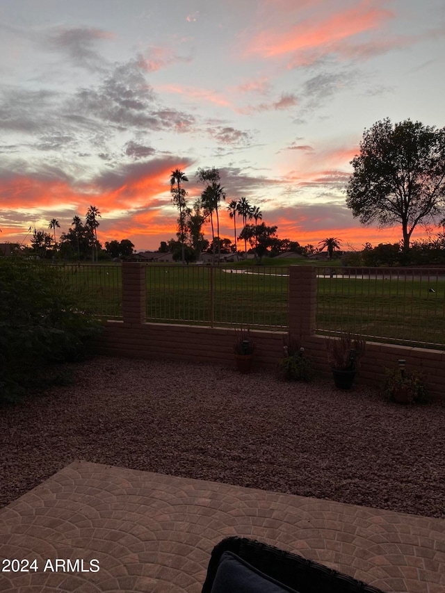 view of patio terrace at dusk