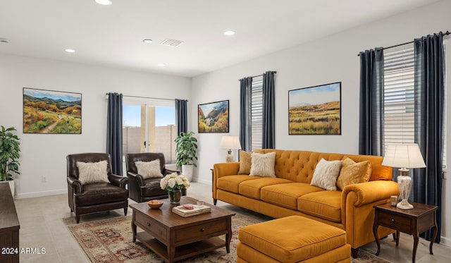 living room featuring light tile patterned flooring