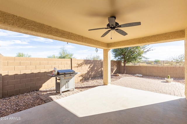 view of patio featuring ceiling fan and grilling area