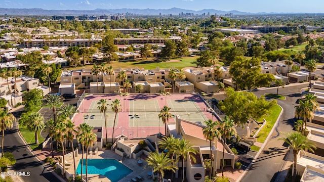 birds eye view of property featuring a mountain view