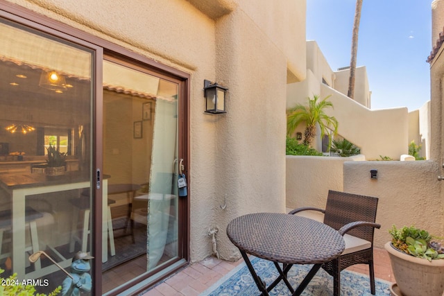 view of patio with a balcony