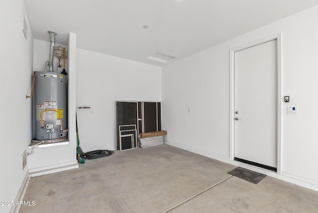 garage featuring gas water heater