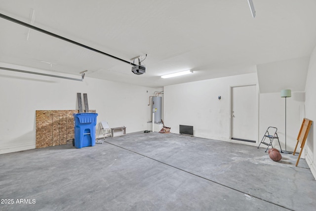 2118 N 77th Ln, Phoenix, AZ 85035 - garage featuring a garage door opener and electric water heater