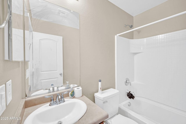 2118 N 77th Ln, Phoenix, AZ 85035 - full bathroom with shower / bathtub combination, toilet, and vanity