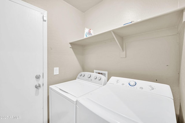 2118 N 77th Ln, Phoenix, AZ 85035 - washroom with washer and clothes dryer