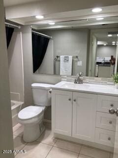 full bathroom featuring vanity, shower / tub combo, tile patterned floors, and toilet