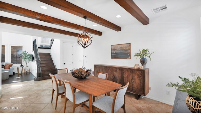 dining space featuring light tile patterned floors, baseboards, visible vents, stairway, and an inviting chandelier