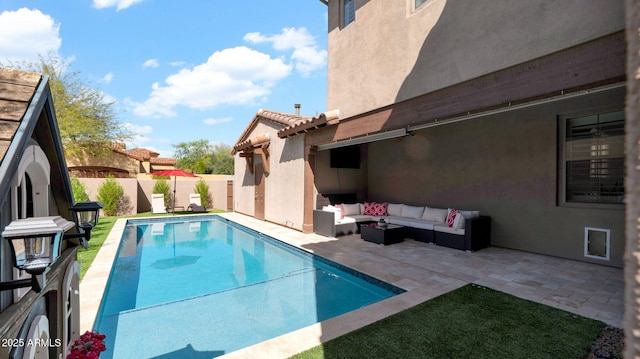 view of pool featuring a fenced in pool, a patio area, a fenced backyard, and an outdoor hangout area