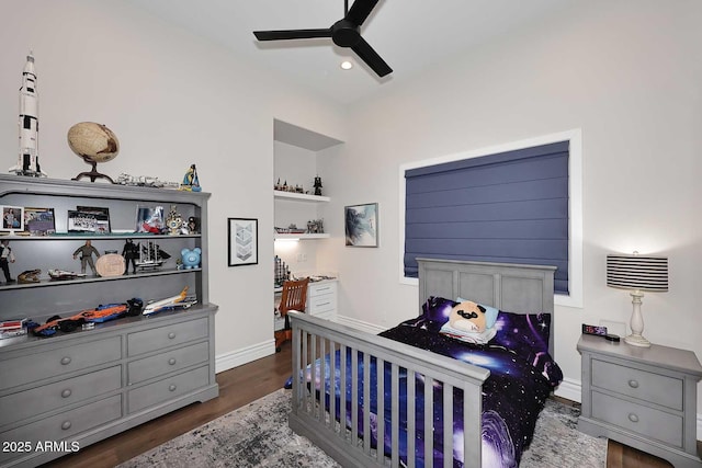 bedroom featuring ceiling fan and dark wood-type flooring