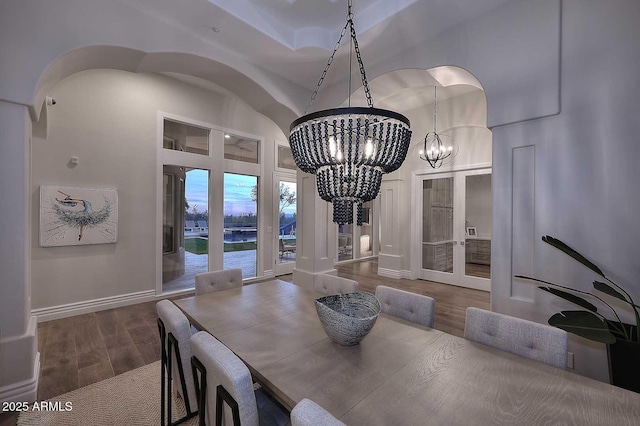 dining space featuring a notable chandelier