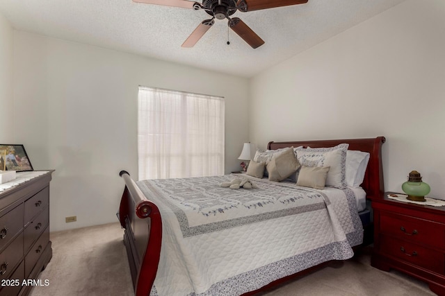 10410 N Cave Creek Rd Unit 2030, Phoenix, AZ 85020 - bedroom with light carpet, a ceiling fan, and a textured ceiling