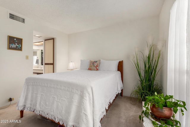 10410 N Cave Creek Rd Unit 2030, Phoenix, AZ 85020 - bedroom with carpet floors and connected bathroom