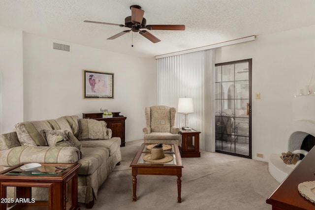 10410 N Cave Creek Rd Unit 2030, Phoenix, AZ 85020 - living room with carpet flooring, ceiling fan, and a textured ceiling