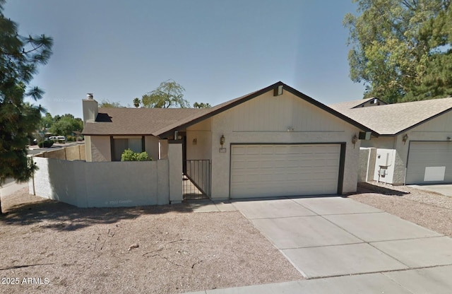 2164 S Estrella Cir, Mesa, AZ 85202 - ranch-style house featuring an attached garage, a chimney, driveway, and a gate
