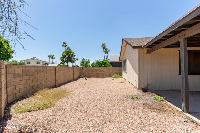 2164 S Estrella Cir, Mesa, AZ 85202 - fenced backyard with a patio