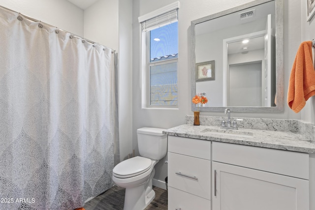 10165 E Gamma Ave, Mesa, AZ 85212 - full bathroom with wood finished floors, vanity, and curtained shower