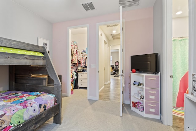 10165 E Gamma Ave, Mesa, AZ 85212 - bedroom featuring a spacious closet, carpet floors, and a closet
