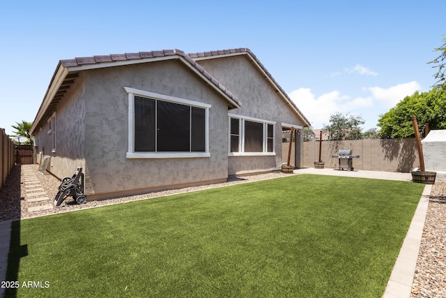 10165 E Gamma Ave, Mesa, AZ 85212 - rear view of property featuring stucco siding, a fenced backyard, and a patio