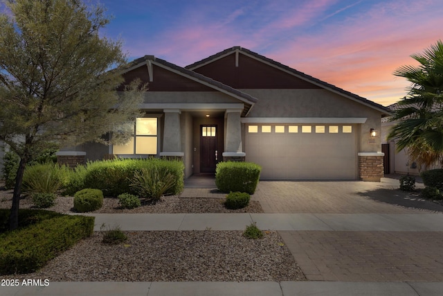 10165 E Gamma Ave, Mesa, AZ 85212 - view of front of home with an attached garage, decorative driveway, stucco siding, and a tile roof