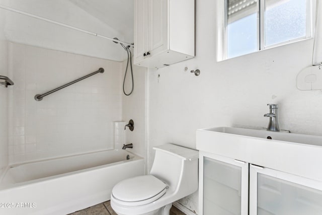 full bathroom featuring bathing tub / shower combination, tile patterned floors, vanity, toilet, and vaulted ceiling