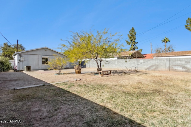 view of yard featuring central AC unit