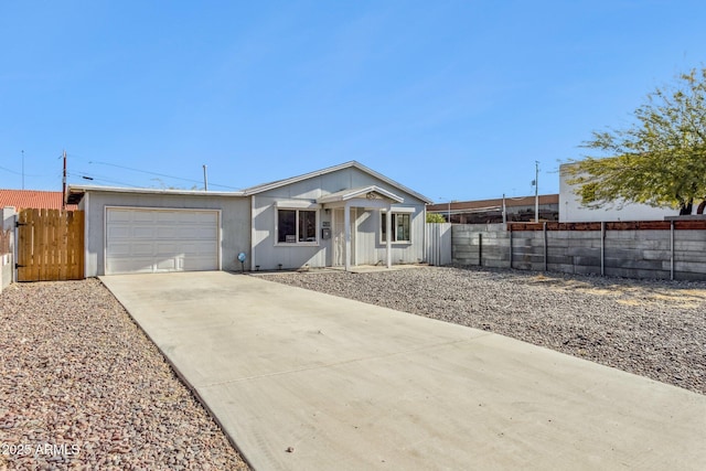 ranch-style home with a garage