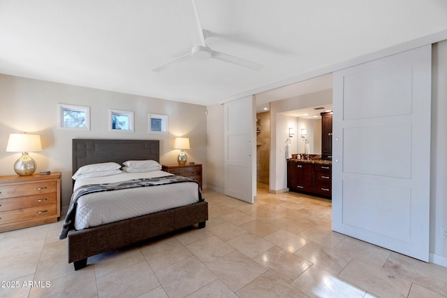 bedroom featuring connected bathroom and ceiling fan