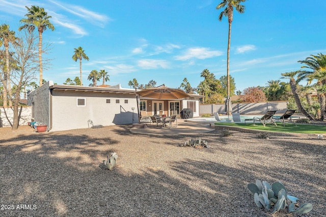 rear view of house with a patio area