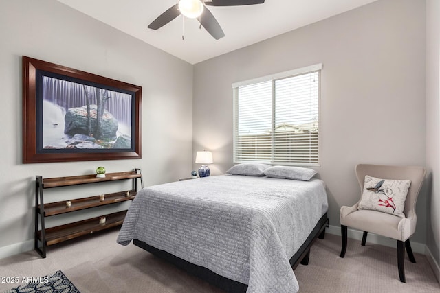 bedroom with carpet flooring, ceiling fan, and baseboards