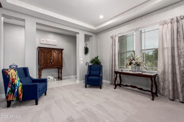 sitting room with carpet floors, recessed lighting, and baseboards