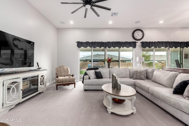 living area with baseboards, visible vents, a ceiling fan, carpet flooring, and recessed lighting