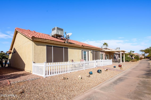 view of front of property featuring central AC unit