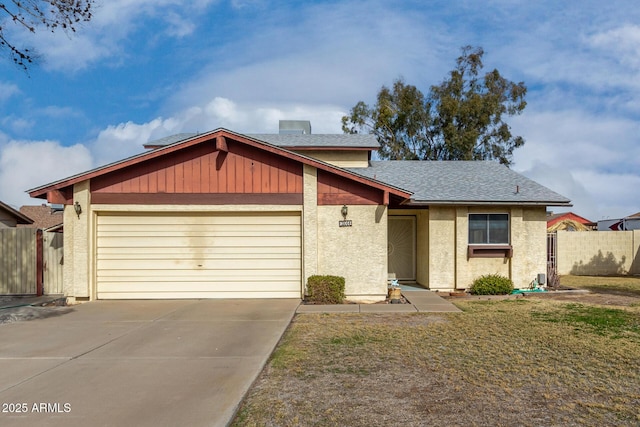 view of front of property with a garage