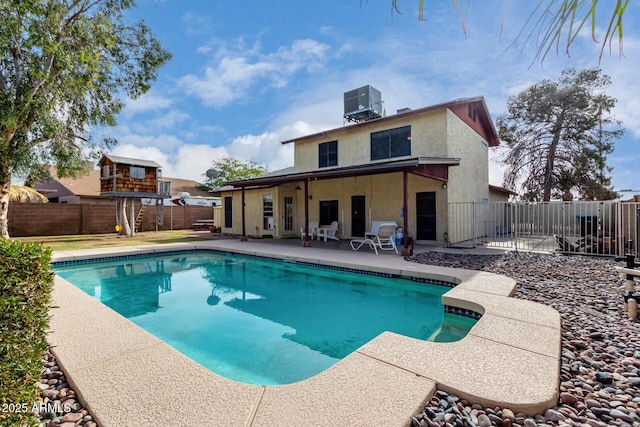 view of pool featuring a patio and cooling unit