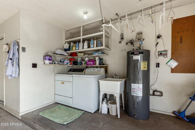 clothes washing area with independent washer and dryer, electric water heater, and a textured ceiling