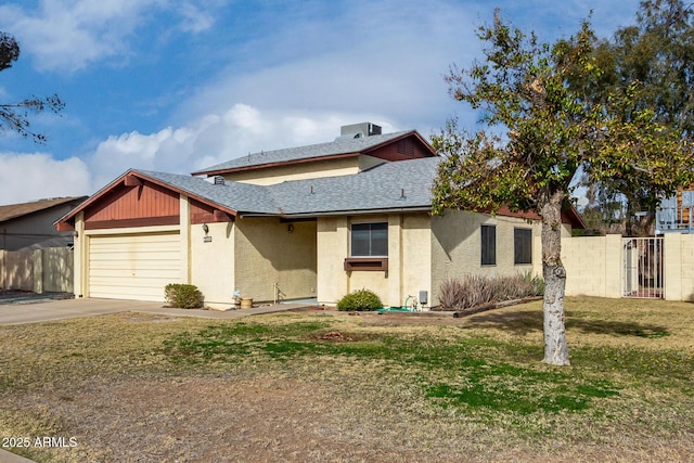 view of front of home with a garage